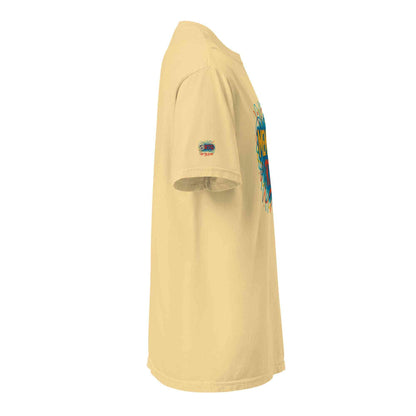 Unisex garment-dyed heavyweight t-shirt side view in soft beige color with printed design and double-needle stitching