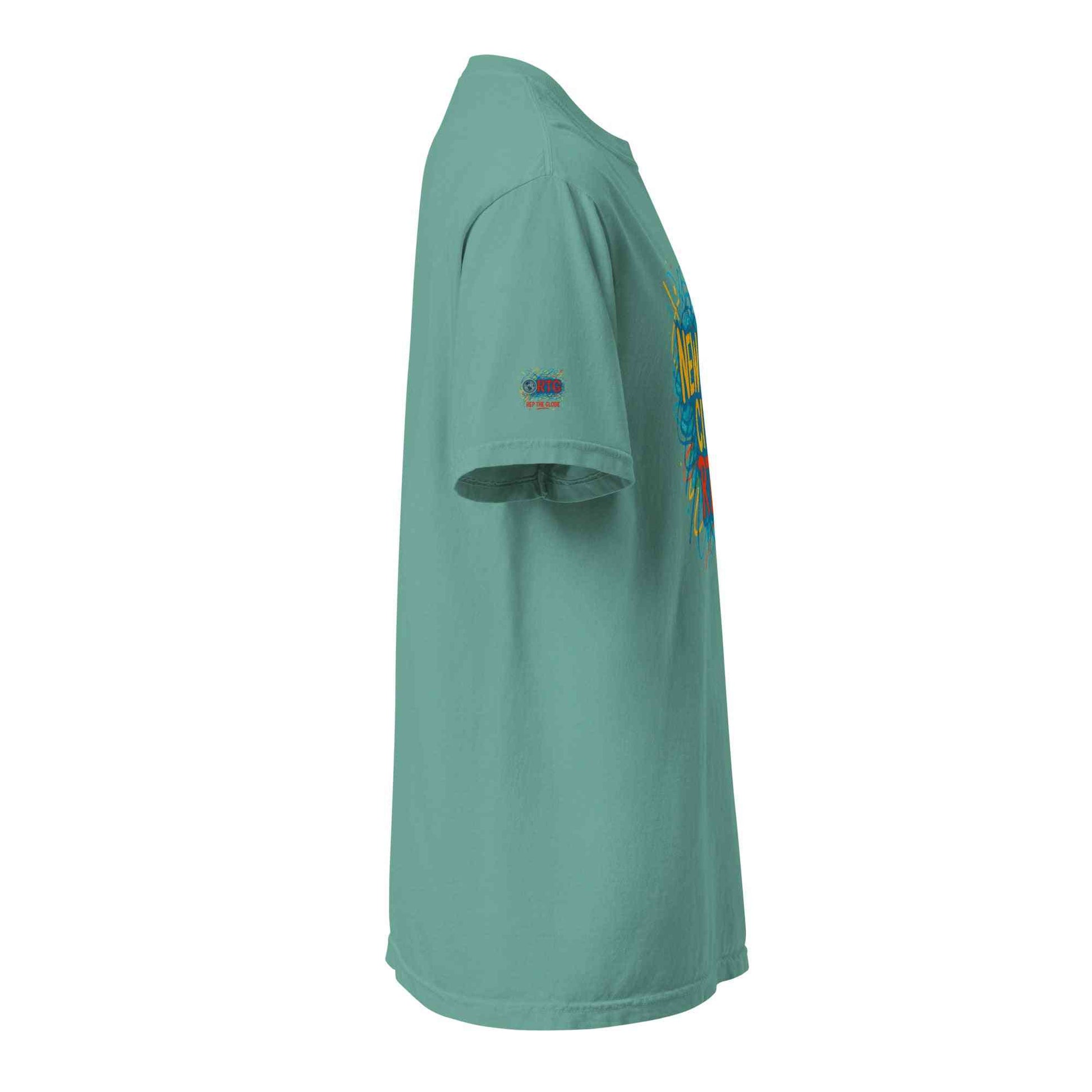 Side view of New York City-Unisex garment-dyed heavyweight t-shirt in teal color